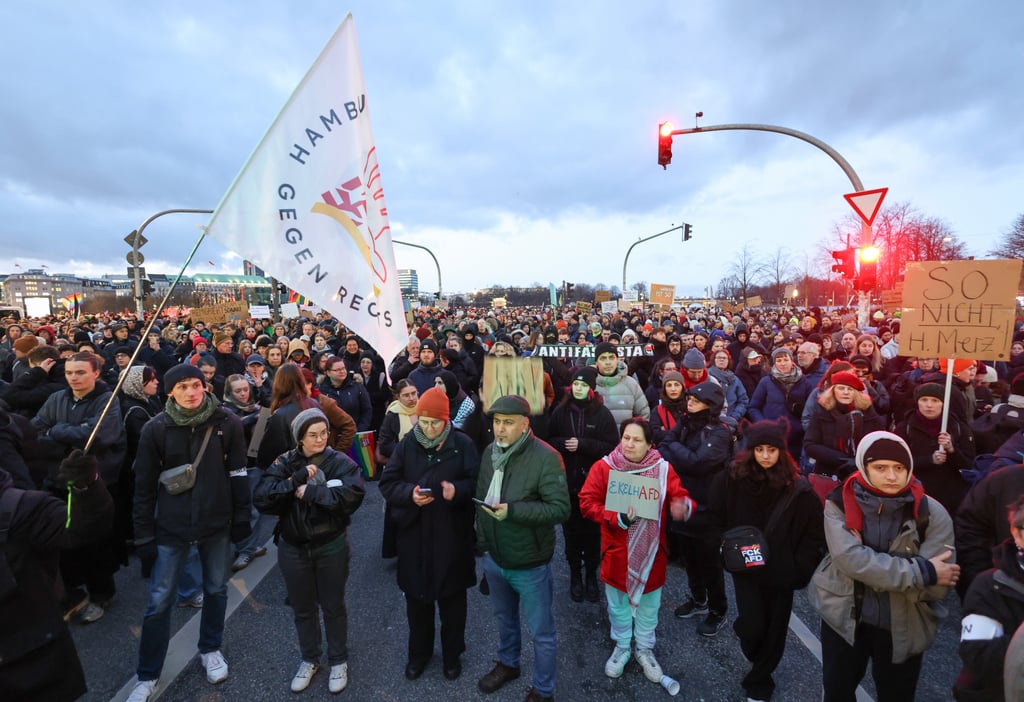 People take part in a demonstration on migration policy in Hamburg, Germany, on Friday. Photo: dpa