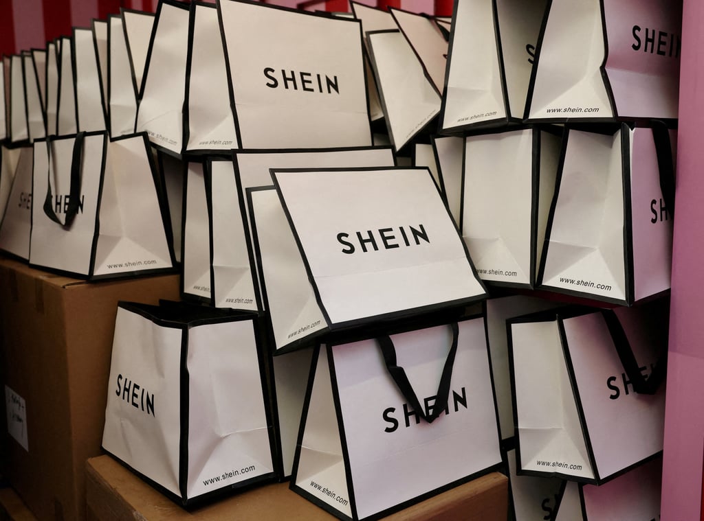 A company logo for Shein is seen on a pile of gift bags. Offerings on the Shein India Fast Fashion app include dresses priced as low as 350 rupees (US$4). Photo: Reuters
