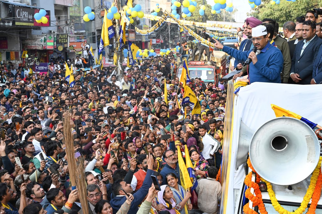 Aam Aadmi Party’s Arvind Kejriwal campaigns for the Delhi state election in New Delhi, India on Monday. Photo: AP