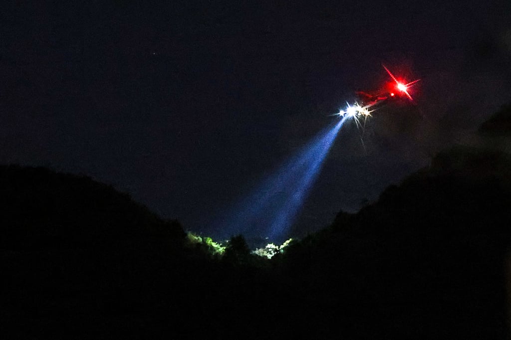 Helicopters hovered over the area for more than three hours. Photo: Jelly Tse