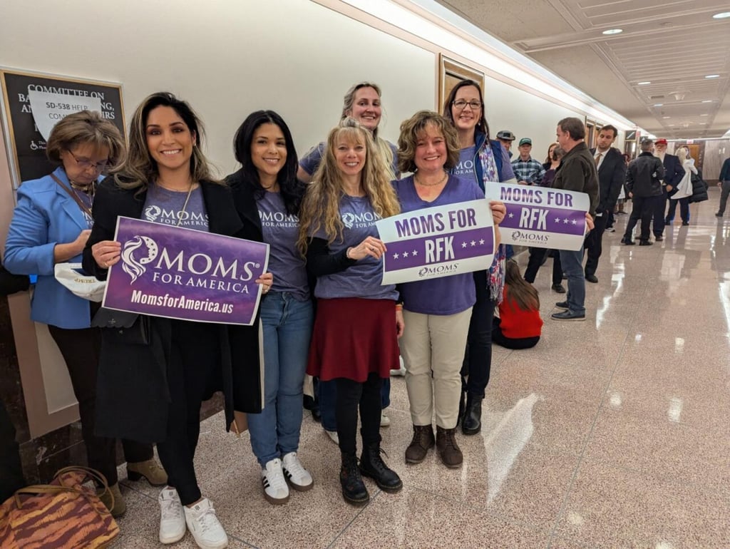 RFK Jnr supporters pose at the US Senate on Capitol Hill in on Thursday. Photo: AFP