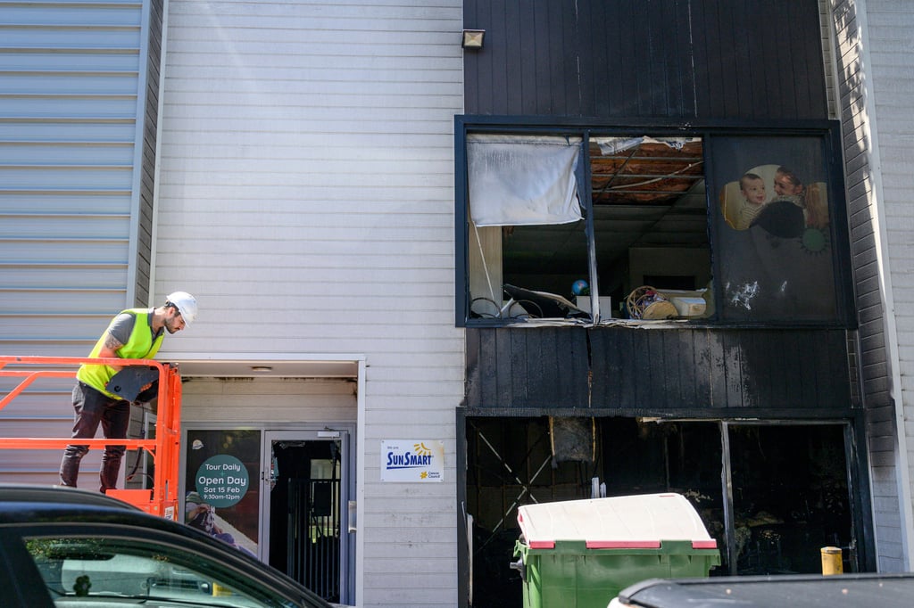 A man works near where fire has damaged a preschool and early learning centre located near a synagogue in Sydney, on January 21, 2025. Photo: AP