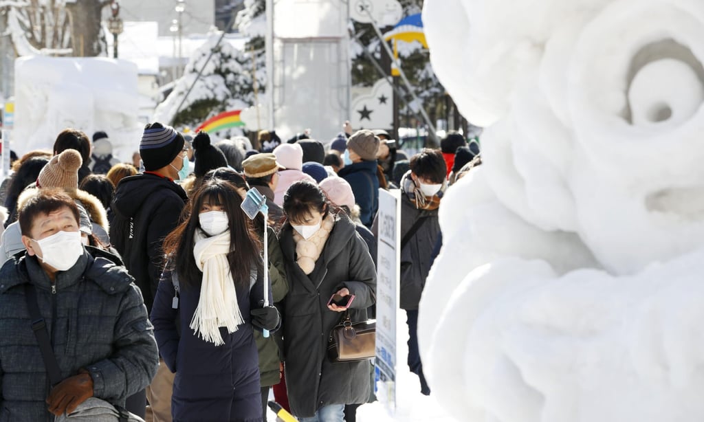 Visitors at the 2020 Sapporo Snow Festival in Hokkaido. Photo: Kyodo