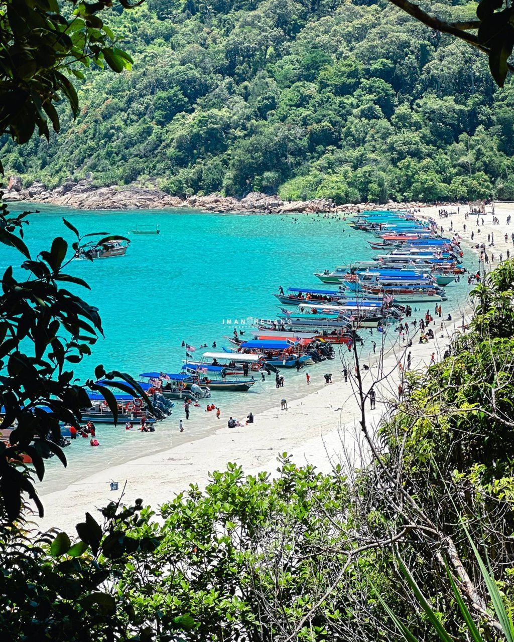 Boats are seen anchored on Redang Island, where hundreds of tourists arrive each day for unregulated trips. Photo: Reef Check Malaysia