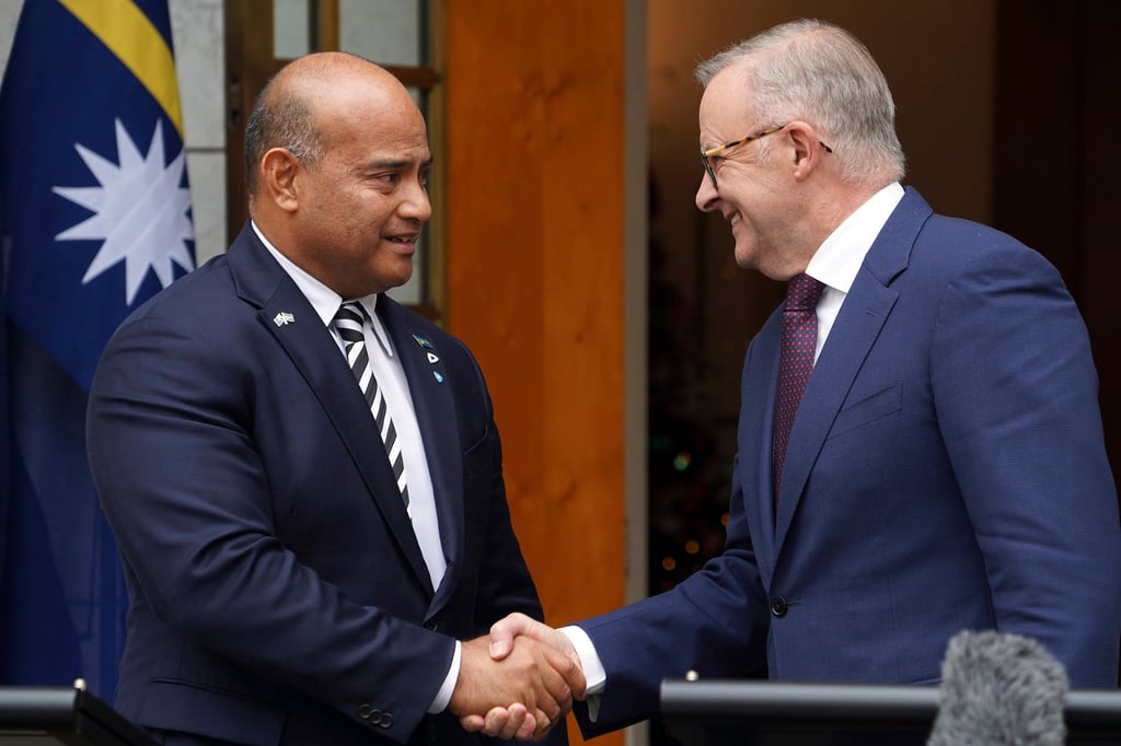 Nauru’s President David Adeang (left) shakes hands with Australian Prime Minister Anthony Albanese during a meeting in Canberra in December. Photo: AAP Image via AP