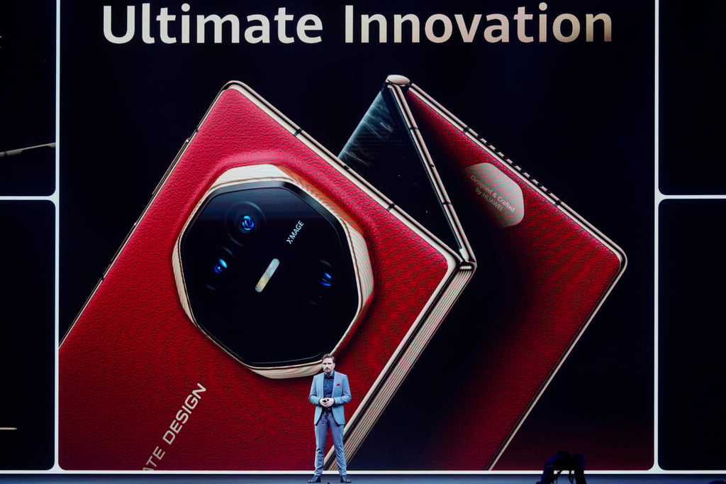 Andreas Zimmer, head of product at Huawei Technologies’ consumer business group, presents the Mate XT trifold smartphone at the global sales roll-out of the handset in Kuala Lumpur, Malaysia, on Tuesday. Photo: AP