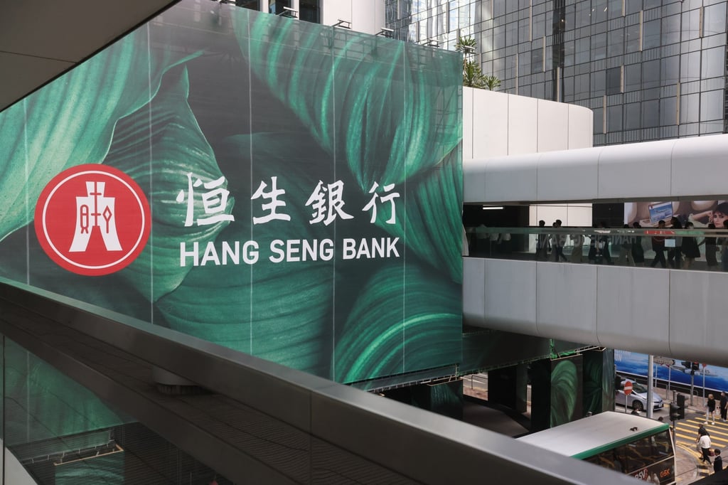 Hang Seng Bank said its loans for property development and property investment fell last year. Photo: Jonathan Wong