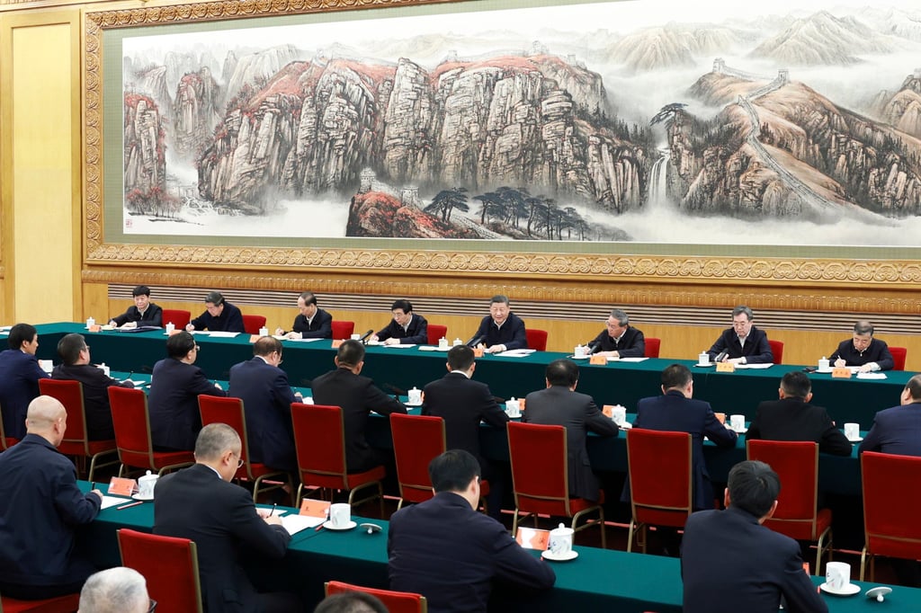 Chinese President Xi Jinping, centre, attends a symposium on private enterprises in Beijing on Monday. Photo: Xinhua