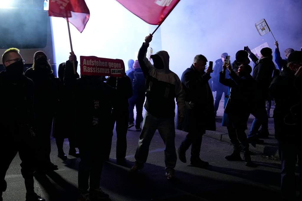 People hold a protest near the AfD party headquarters in Berlin, Germany on Sunday. Photo: AP