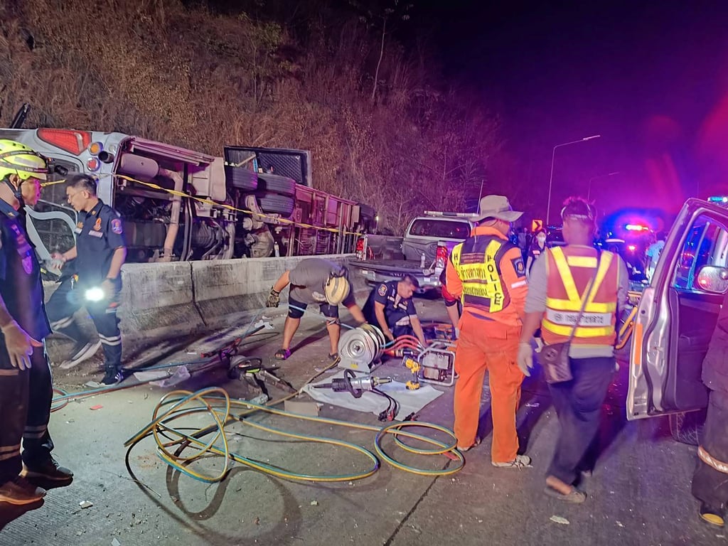 Rescue personnel at the scene. Photo: Prachinburi Highway District via Reuters