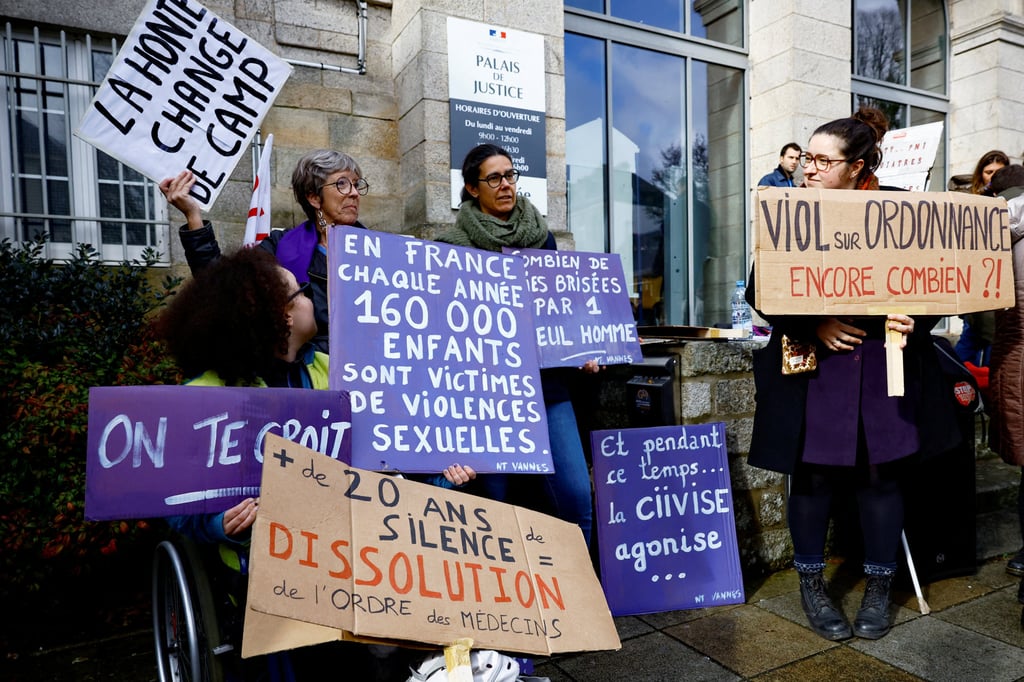 Members of women’s collectives, doctors, NGOs and unions protest in front of the courthouse in France on the day of the trial of ex-surgeon Joel Le Scouarnec, accused of rape, aggravated rape and sexual assault against hundreds of children over several decades. Photo: Reuters