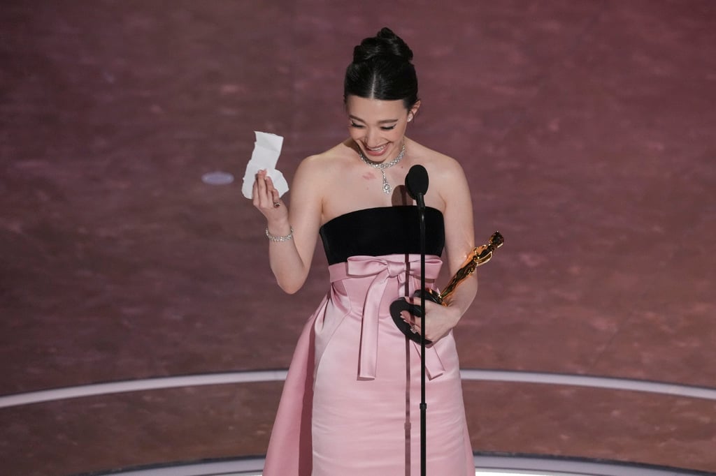 Mikey Madison accepts the Oscar for best actress for Anora. Photo: AP