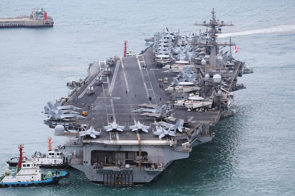 The USS Carl Vinson, a US nuclear-powered aircraft carrier, docks at a naval base in the South Korean port city of Busan on Sunday. Photo: Yonhap/AFP