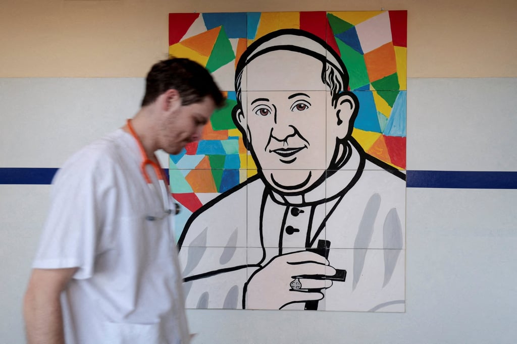 A painting depicting Pope Francis at Rome’s Gemelli hospital. Photo: Reuters
