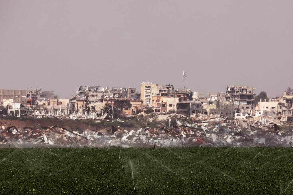 Sprinklers water a field on the Israeli side of the Israel-Gaza border. Photo: Reuters