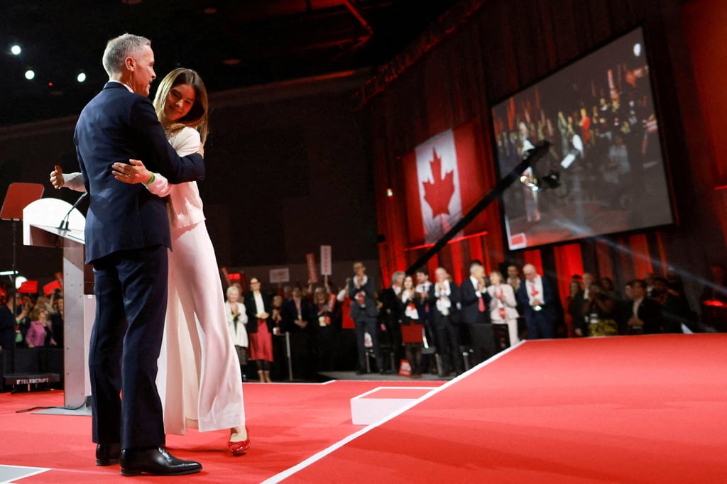 Mark Carney and his daughter Cleo Carney. Photo: Reuters