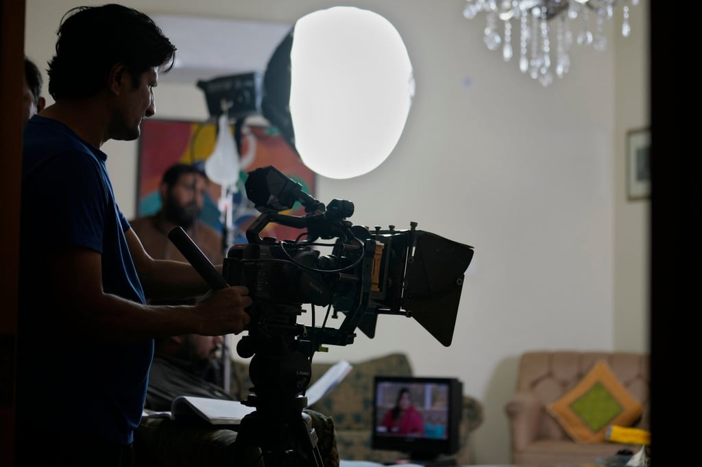 A cameraman films a scene for Pakistani drama Aadi Si Bewai in Islamabad, Pakistan. Photo: AP
