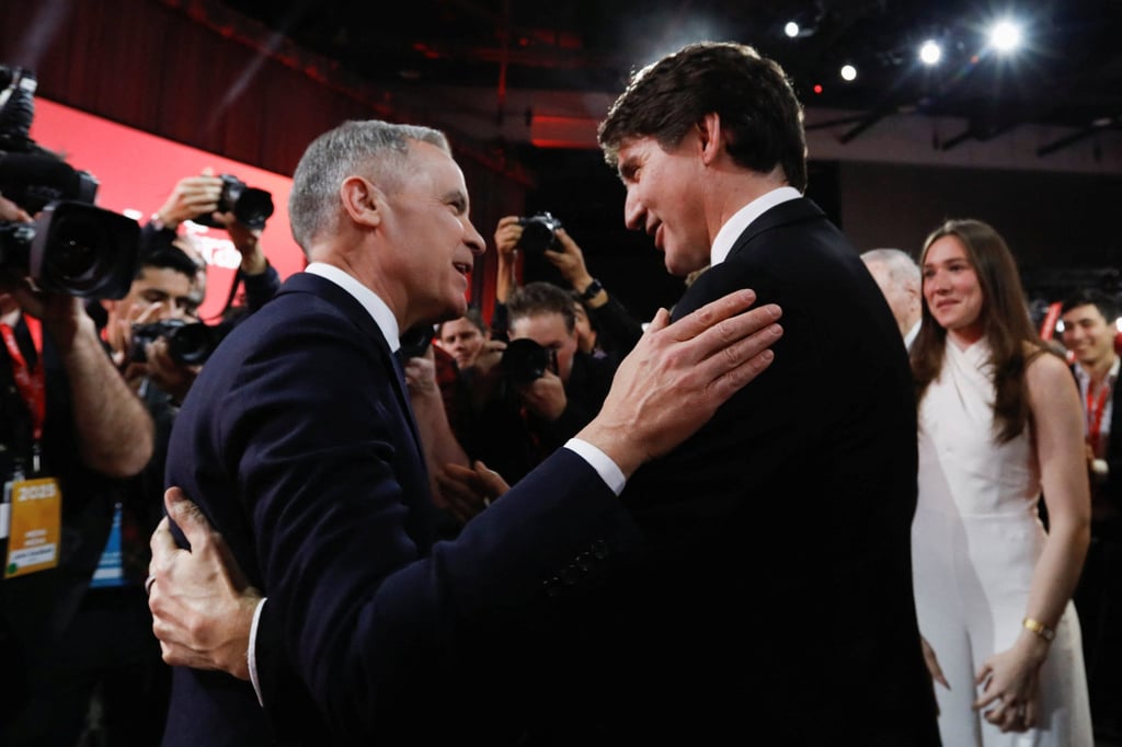 Mark Carney and outgoing Prime Minister Justin Trudeau. Photo: Reuters