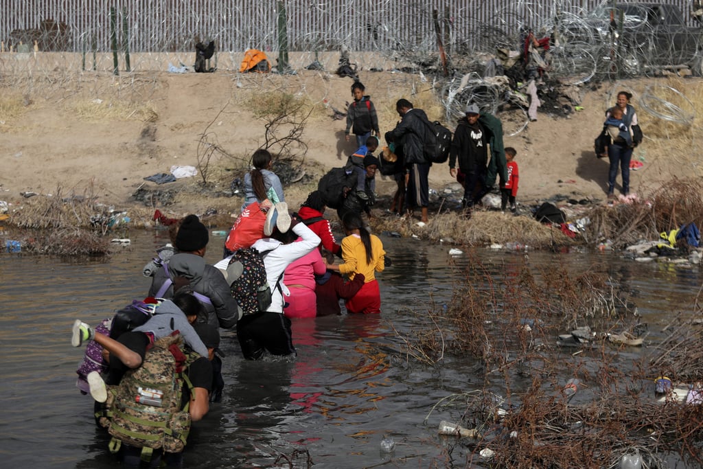 Migrants cross the Rio Grande to reach the US through Ciudad Juarez, Chihuahua State, Mexico. File photo: TNS