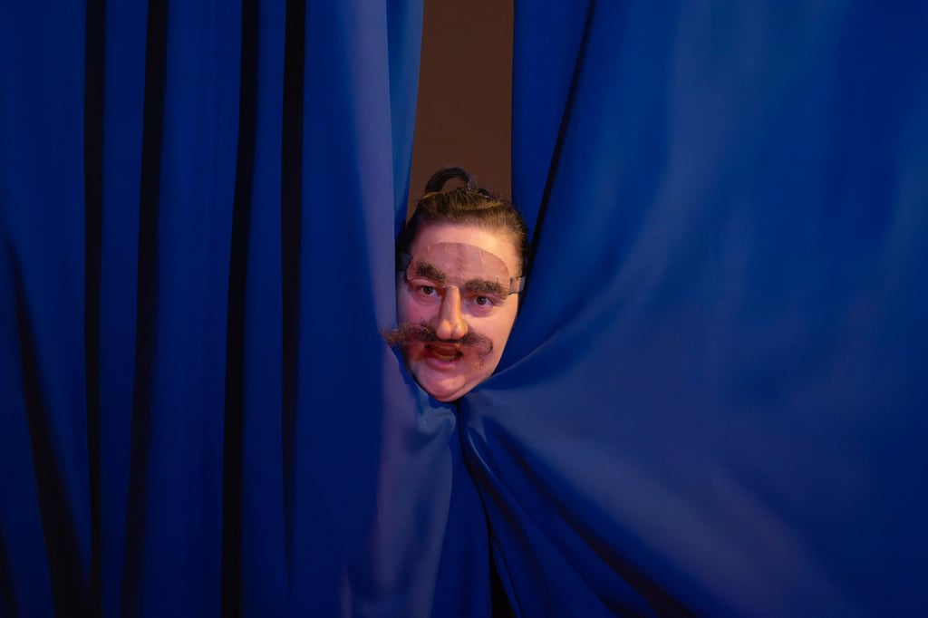 An actress performs a male role on the stage at the Chernihiv Regional Youth Theatre. Photo: AP