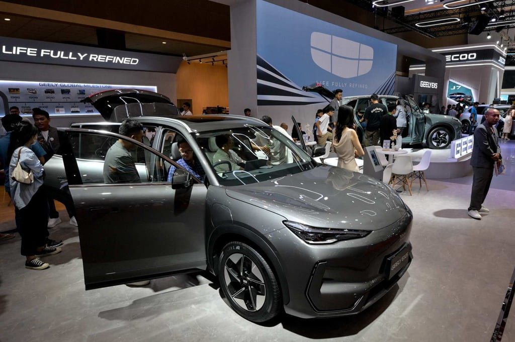 Visitors look at EVs from the Geely brand at the Indonesia International Motor Show 2025 in Jakarta on February 14. Photo: AFP