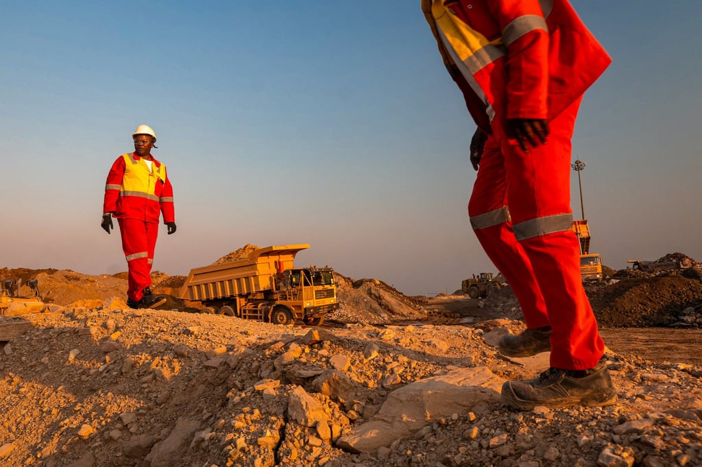 Workers direct lorry traffic in Tenke Fungurume Mine, one of the largest copper and cobalt mines in the world, in southeastern Democratic Republic of Congo on June 17, 2023. Photo: AFP