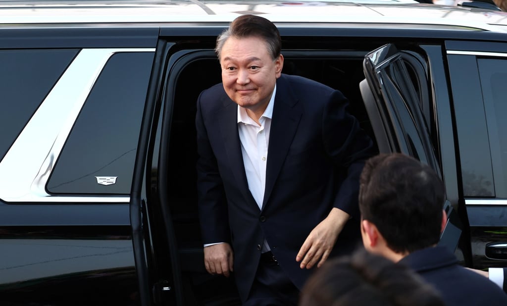 South Korea’s impeached president Yoon Suk-yeol arrives at his official residence after being released from detention on March 8. Photo: EPA-EFE