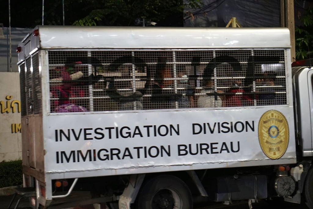 Unidentified detainees leave an immigration detention centre in Bangkok, Thailand, on February 27. Photo: Prachatai newspaper via AP