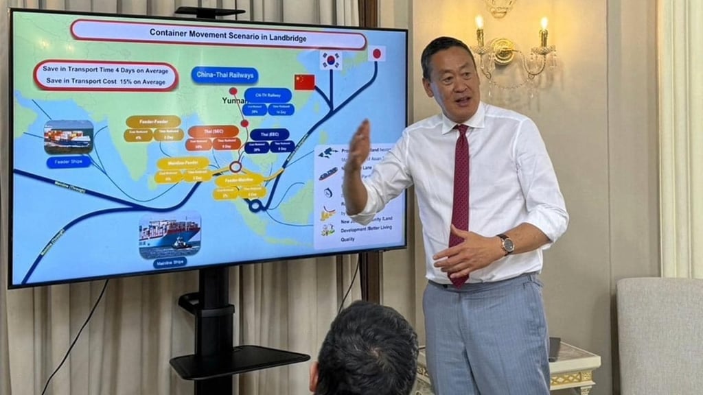 Srettha Thavisin, Thailand’s then-prime minister, stands in front of an infographic depicting the Landbridge project at a presentation in November 2023. Photo: Facebook/Srettha Thavisin