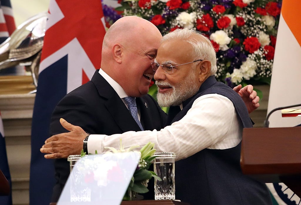 Indian Prime Minister Narendra Modi, right, hugs New Zealand’s Prime Minister Christopher Luxon after delivering a statement following a meeting at Hyderabad House in New Delhi on March 17. Photo: EPA-EFE