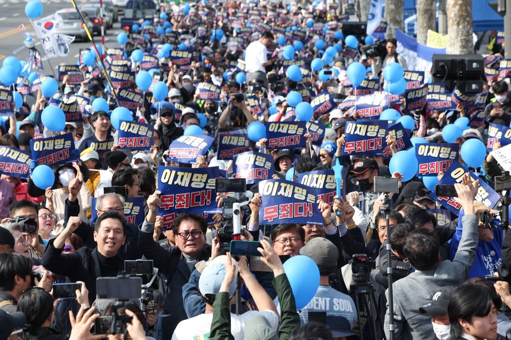 Supporters of Lee Jae-myung celebrate in Seoul on Wednesday. Photo: Yonhap/EPA-EFE