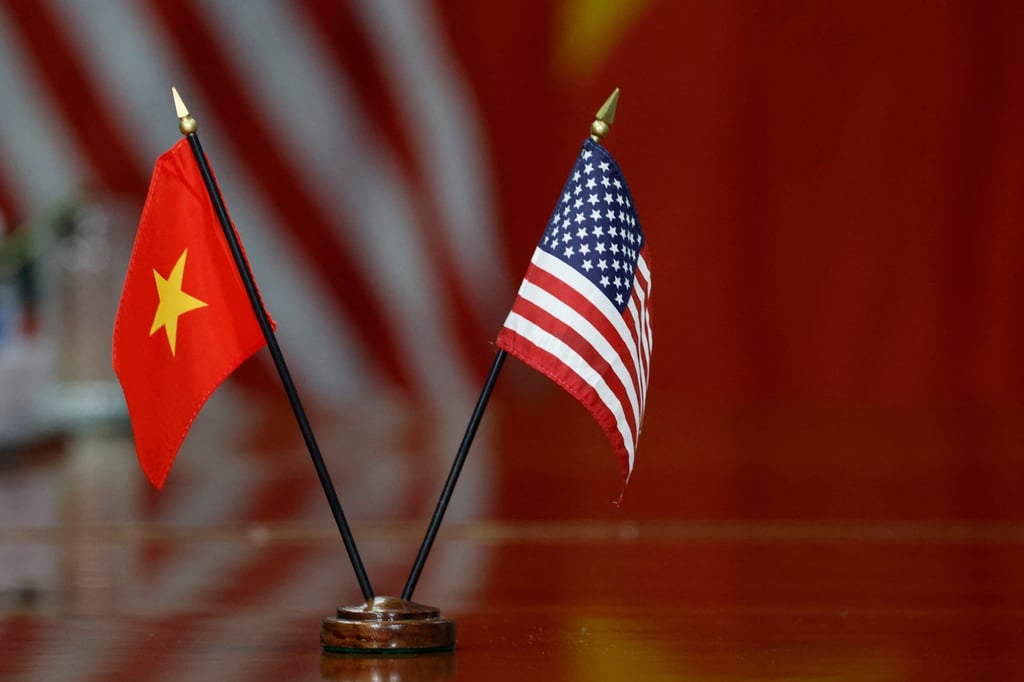 Flags of the United States and Vietnam sit on a table during a bilateral meeting in the US last year. Photo: Getty Images via AFP