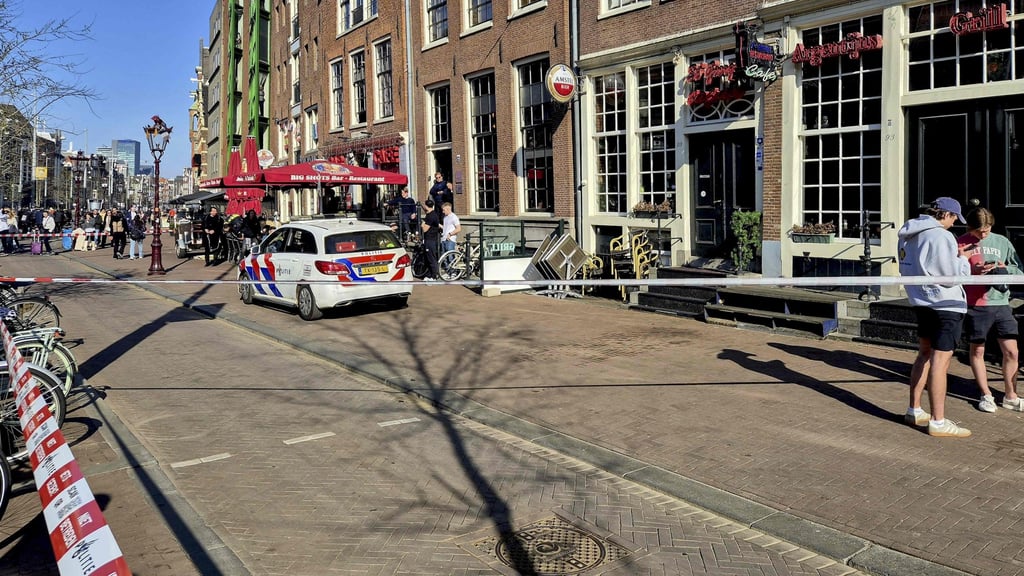 Police cordon the area near the central Dam Square in Amsterdam after a stabbing on March 27, 2025. Photo: AFP
