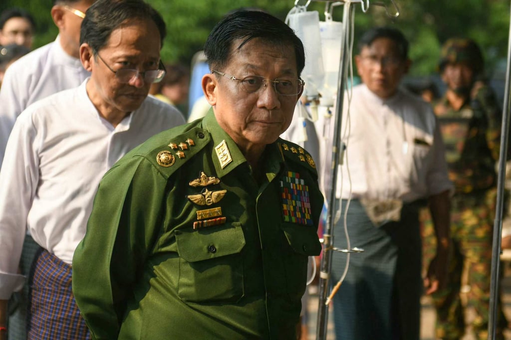 Myanmar junta chief Min Aung Hlaing arrives at a hospital compound in Naypyidaw on Friday to meet earthquake survivors. Photo: AFP