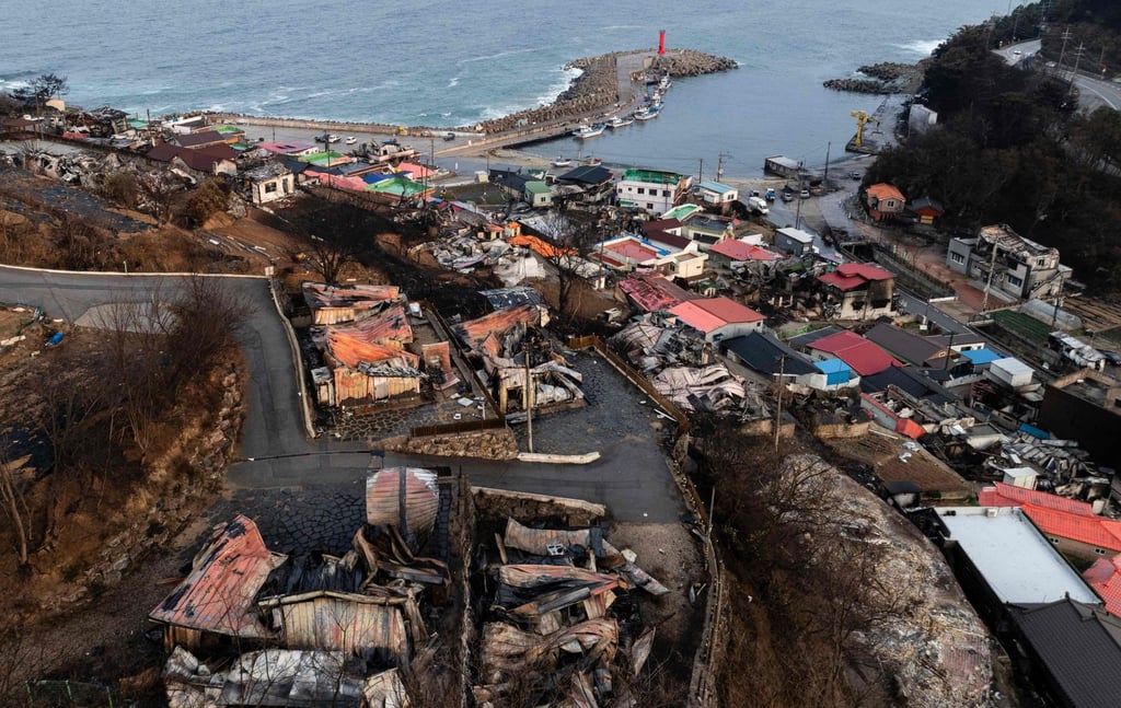 An aerial view of homes ravaged by wildfires in a coastal village in Yeongdeok, South Korea, on Friday. Photo: AFP