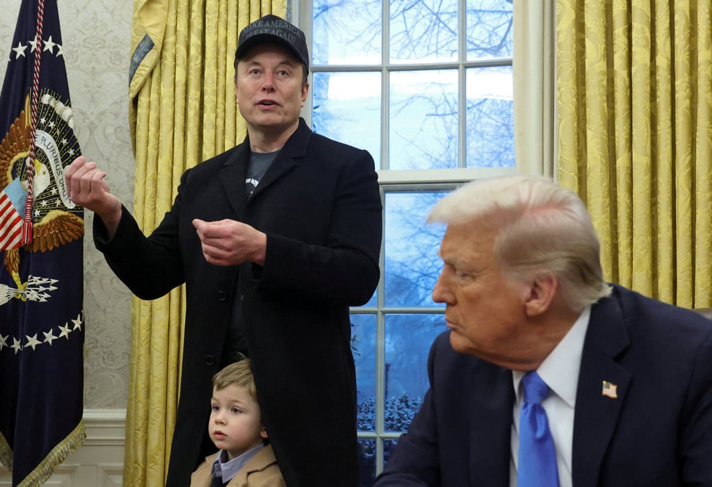 Elon Musk (left) speaks as his son X Æ A-12 and US President Donald Trump listen in the Oval Office in February. Photo: Reuters