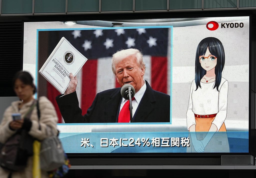 A street monitor in Tokyo shows US President Donald Trump speaking on Wednesday, when he announced fresh tariffs on American imports from Japan and dozens of other countries. Photo: Kyodo