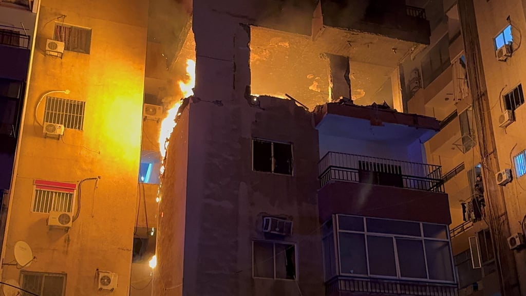 Fire burns at a building floor following an Israeli strike on Friday. Lebanese Prime Minister Nawaf Salam’s office said Friday’s Israeli attack was a clear violation of a US-backed ceasefire. Photo: Reuters