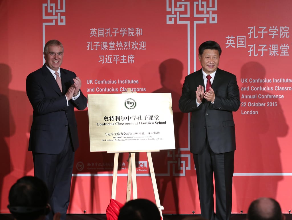Chinese President Xi Jinping and Britain’s Prince Andrew unveil the 1,000th Confucius Classroom at Hautlieu School in London in October 2015. Photo: Xinhua