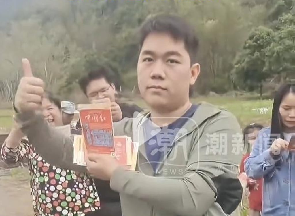 The man took a total of 60 lottery scratch cards to his ancestors’ tomb during a recent festival. Photo: Handout