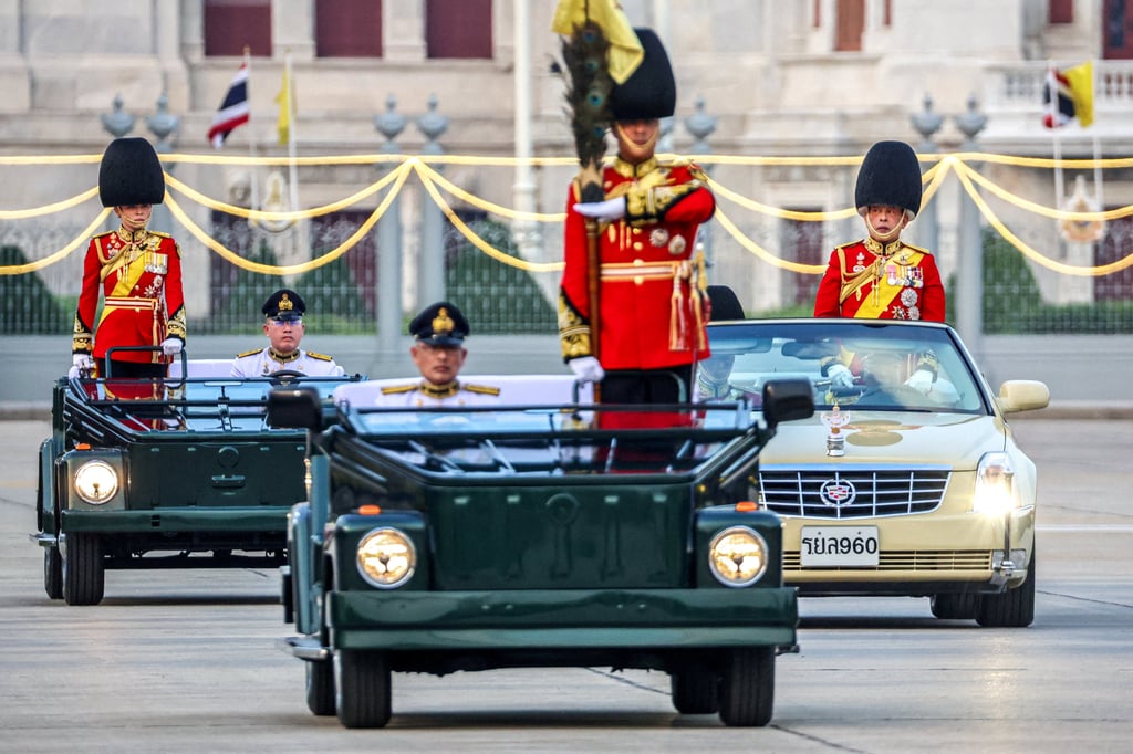 Thailand’s King Maha Vajiralongkorn and Queen Suthida review the guard of honour during a trooping of the colours ceremony to mark the king’s 72nd birthday in Bangkok on December 3, 2024. Photo: Reuters