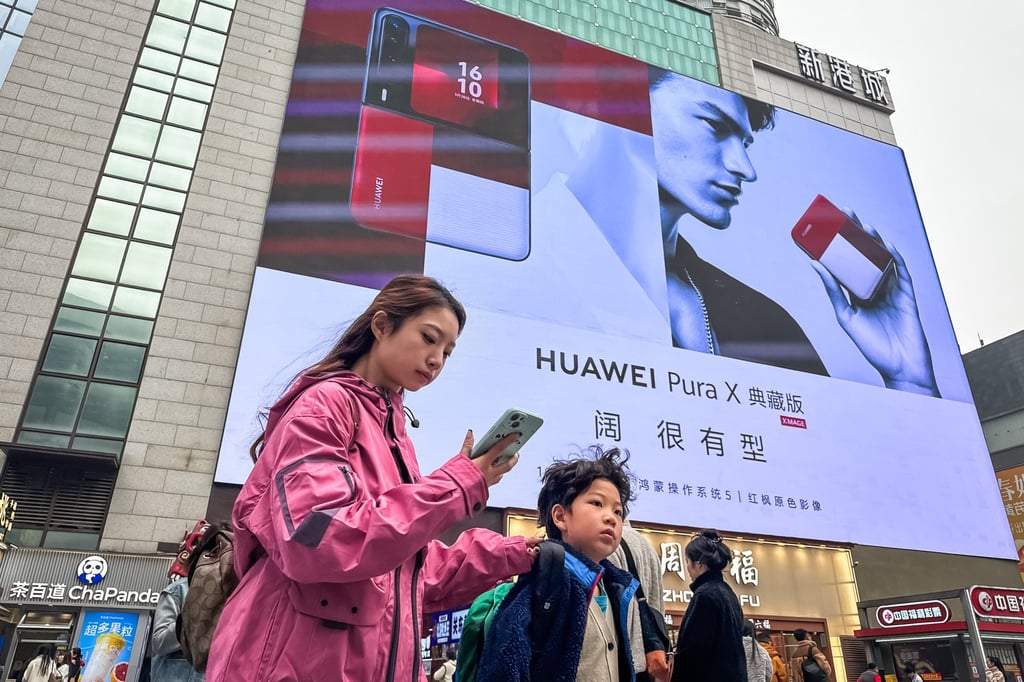 A billboard advertisement for a Huawei smartphone in Chongqing, China. Photo: Getty Images