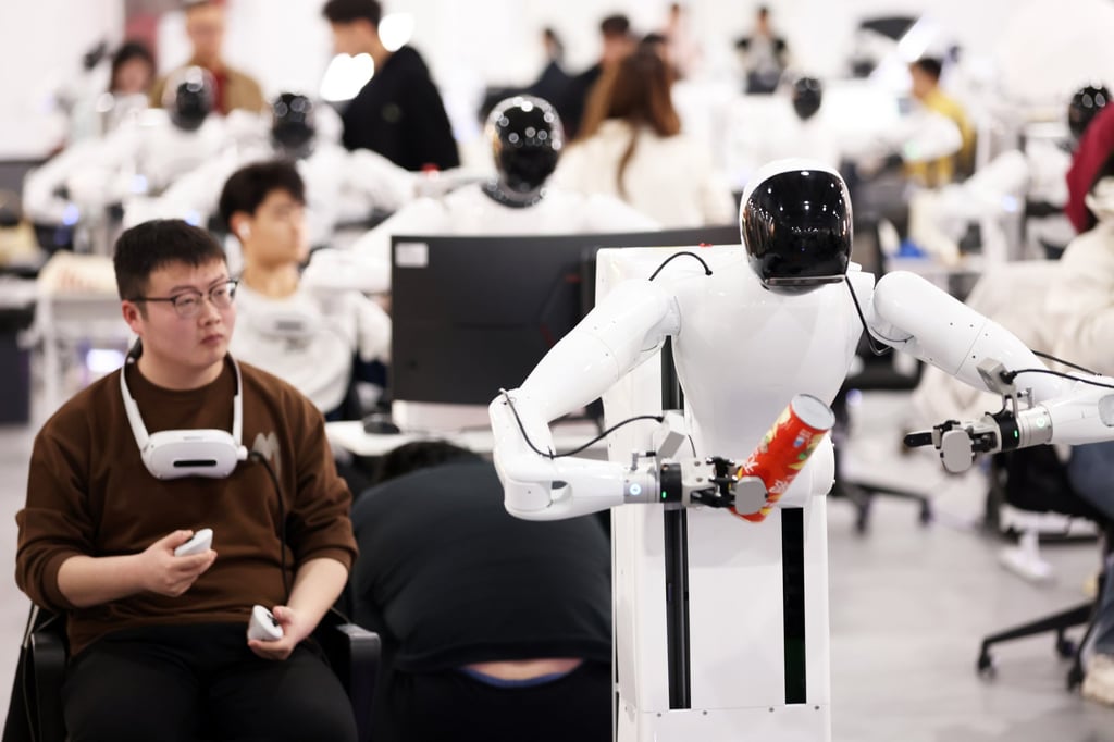 Staff members train humanoid robots at AgiBot’s data collection centre in Shanghai. Photo: China News Service/VCG via Getty Images