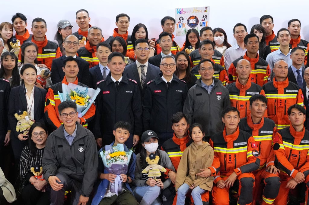 The rescuers were also welcomed by family members at the airport. Photo: May Tse