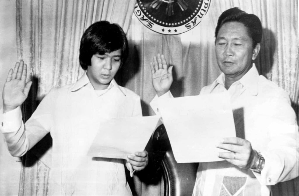 Philippine President Ferdinand Marcos Snr (right) inducts his son, Ferdinand Marcos Jnr, as special assistant to the president on November 24, 1978. Photo: UPI