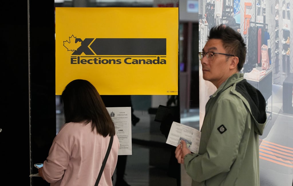 Voters wait in line to cast their ballots at an advance polling station in Richmond, British Columbia, Canada, on Friday. Canada’s federal election advance polls opened on Friday, giving voters several days to cast their ballots ahead of the official election day on April 28. Photo: Xinhua