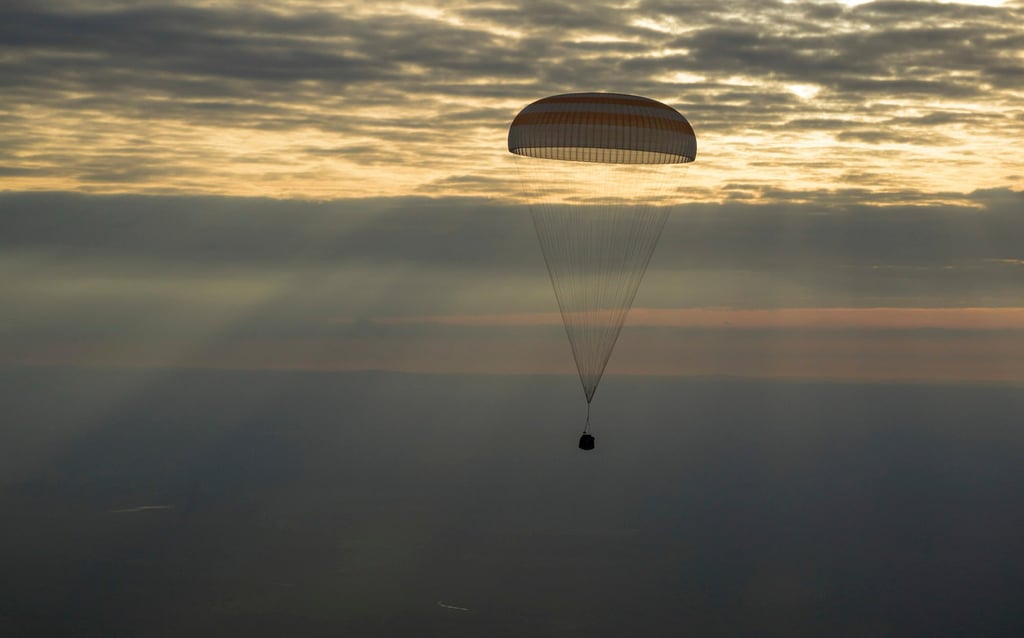 The Soyuz MS-26 spacecraft with Roscosmos cosmonauts Ivan Vagner, Alexey Ovchinin and Nasa astronaut Don Pettit on board descends by parachute on Sunday. Photo: Nasa/Planet Pix via ZumaPress Wire/dpa