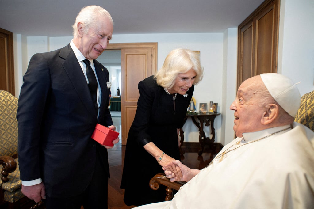 Pope Francis meets with Britain’s King Charles and Queen Camilla during a private audience at the Vatican on April 9. Photo: Vatican Media/Reuters