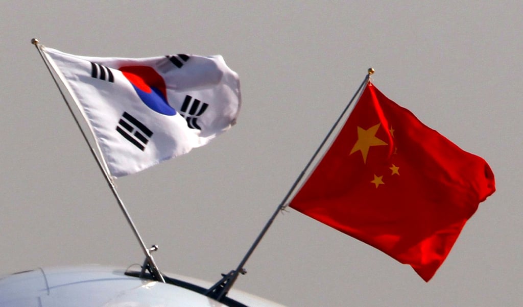 South Korean and Chinese national flags. South Korea’s Foreign Minister Cho Tae-yul says the ongoing US-China trade war will not halt Seoul’s deepening engagement with Beijing. Photo: Reuters