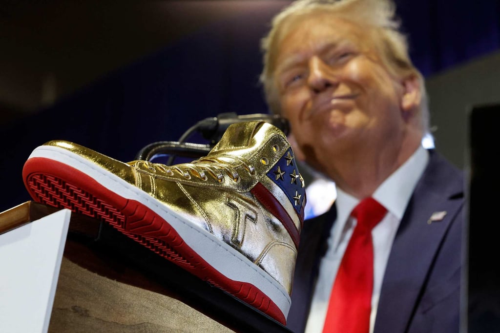 Donald Trump introduces a new line of signature gold shoes at Sneaker Con in Philadelphia, Pennsylvania, in February 2024. Photo: AFP